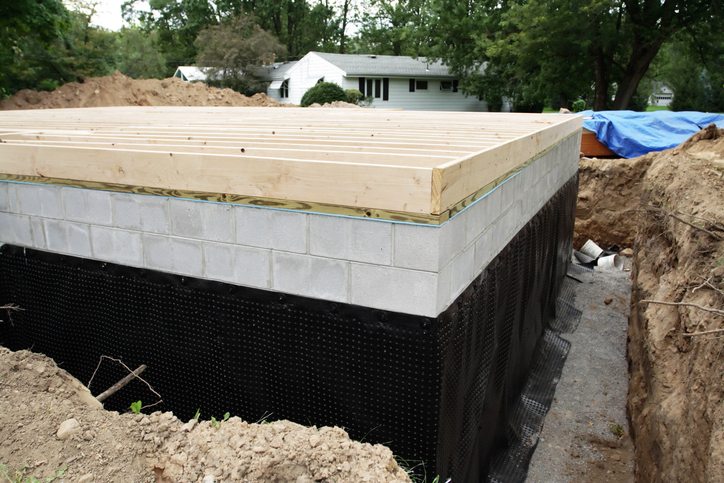 Foundation with concrete block walls and a wooden frame in Dallas, TX