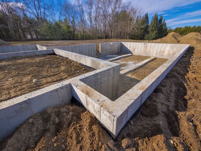 Concrete foundation with walls and trench for construction in Dallas, TX