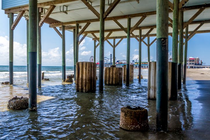 Foundation support piers beneath a coastal pier structure in Dallas, TX